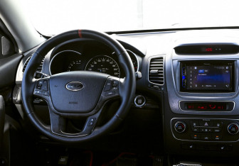 Подержанный автомобиль Kia Sorento 2013 года (19 фото)