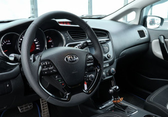 Подержанный автомобиль Kia Ceed Hatchback 2014 года (9 фото)