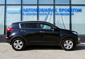 Подержанный автомобиль Kia Sportage 2013 года (6 фото)