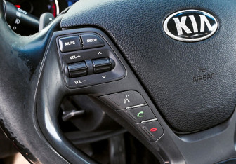 Подержанный автомобиль Kia Cerato Sedan 2014 года (12 фото)