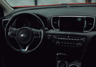 Подержанный автомобиль Kia Sportage 2018 года (10 фото)