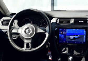 Подержанный автомобиль Volkswagen Jetta Sedan 2014 года (17 фото)
