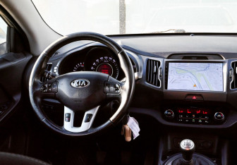 Подержанный автомобиль Kia Sportage 2014 года (19 фото)