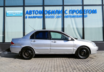 Подержанный автомобиль Mitsubishi Lancer Sedan 2004 года (6 фото)