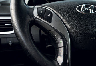 Подержанный автомобиль Hyundai i30 Hatchback 2012 года (13 фото)