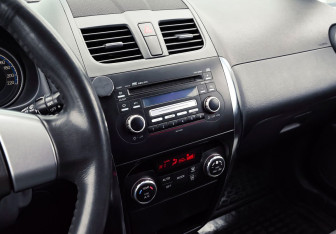 Подержанный автомобиль Suzuki SX4 Hatchback 2010 года (5 фото)