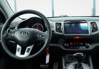 Подержанный автомобиль Kia Sportage 2010 года (10 фото)