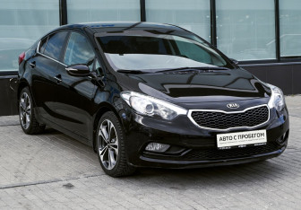 Подержанный автомобиль Kia Cerato Sedan 2013 года (7 фото)