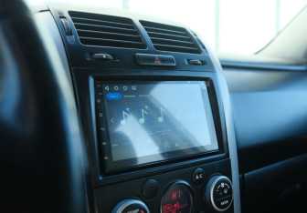 Подержанный автомобиль Suzuki Grand Vitara 2013 года (12 фото)