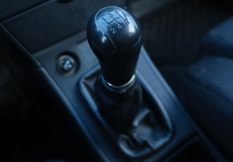 Подержанный автомобиль Toyota Corolla Sedan 2005 года (14 фото)