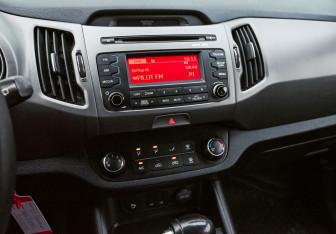 Подержанный автомобиль Kia Sportage 2014 года (13 фото)