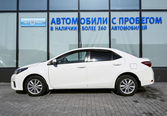 Подержанный автомобиль Toyota Corolla Sedan 2013 года (2 фото)