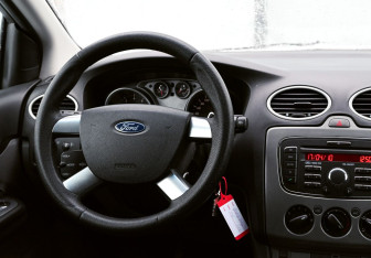 Подержанный автомобиль Ford Focus Hatchback 2010 года (11 фото)