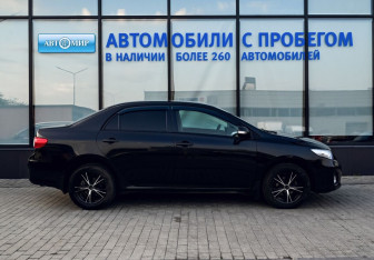 Подержанный автомобиль Toyota Corolla Sedan 2012 года (6 фото)