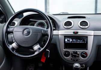 Подержанный автомобиль Chevrolet Lacetti Hatchback 2009 года (11 фото)