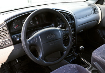 Подержанный автомобиль Kia Spectra Sedan 2007 года (10 фото)