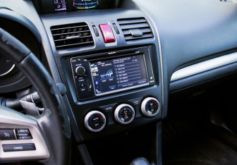 Подержанный автомобиль Subaru XV 2014 года (15 фото)