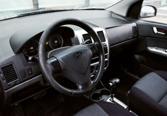 Подержанный автомобиль Hyundai Getz 2010 года (13 фото)