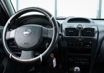 Подержанный автомобиль Nissan Almera Classic 2006 года (10 фото)