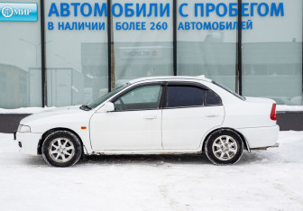 Подержанный автомобиль Mitsubishi Lancer Sedan 2000 года (3 фото)