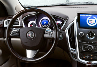 Подержанный автомобиль Cadillac SRX 2011 года (19 фото)