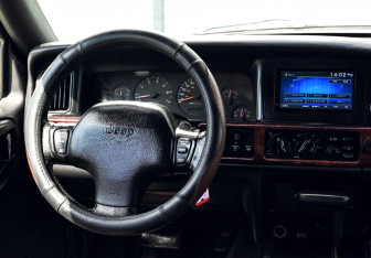 Подержанный автомобиль Jeep Grand Cherokee 1995 года (23 фото)