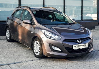 Подержанный автомобиль Hyundai i30 Hatchback 2014 года (7 фото)