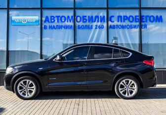 Подержанный автомобиль BMW X4 2015 года (2 фото)