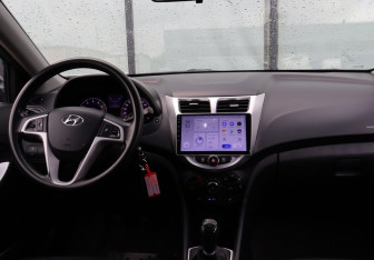 Подержанный автомобиль Hyundai Solaris Sedan 2012 года (18 фото)