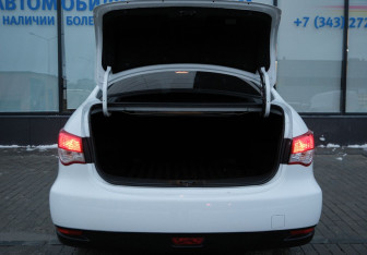 Подержанный автомобиль Nissan Almera Sedan 2014 года (16 фото)