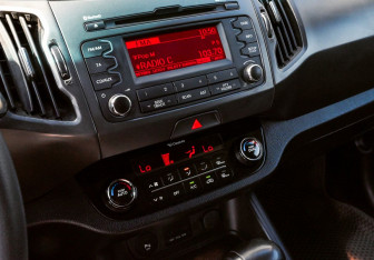 Подержанный автомобиль Kia Sportage 2013 года (15 фото)