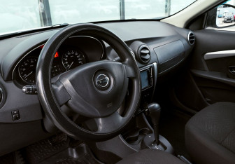 Подержанный автомобиль Nissan Almera Sedan 2014 года (12 фото)