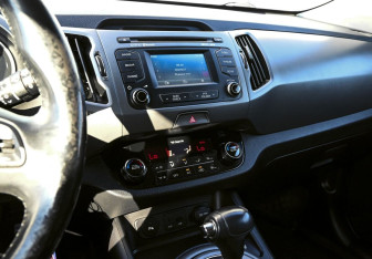 Подержанный автомобиль Kia Sportage 2014 года (11 фото)