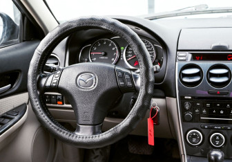 Подержанный автомобиль Mazda 6 Sedan 2006 года (19 фото)