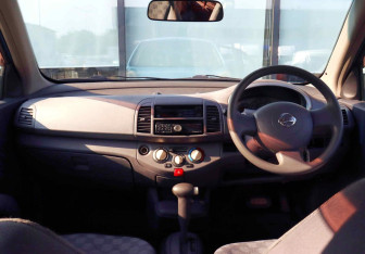 Подержанный автомобиль Nissan March Hatchback 2002 года (15 фото)
