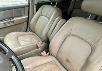 Подержанный автомобиль Kia X-Trek 2004 года (13 фото)