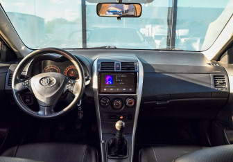 Подержанный автомобиль Toyota Corolla Sedan 2008 года (18 фото)