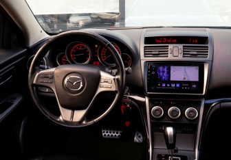 Подержанный автомобиль Mazda 6 Liftback 2008 года (19 фото)