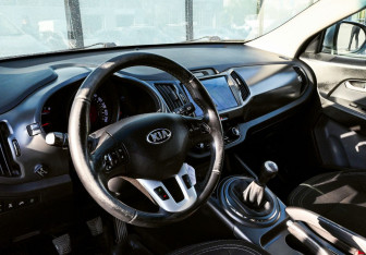 Подержанный автомобиль Kia Sportage 2014 года (15 фото)
