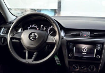 Подержанный автомобиль Skoda Rapid Liftback 2018 года (17 фото)