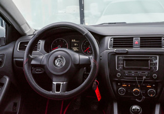 Подержанный автомобиль Volkswagen Jetta Sedan 2013 года (17 фото)