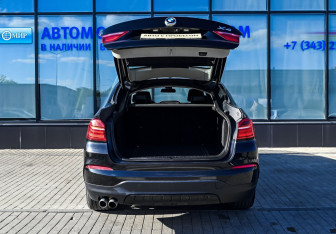 Подержанный автомобиль BMW X4 2015 года (19 фото)