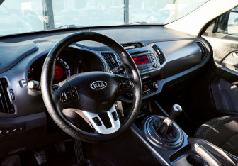 Подержанный автомобиль Kia Sportage 2012 года (15 фото)