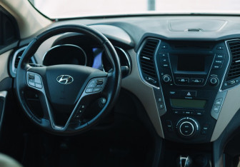 Подержанный автомобиль Hyundai Santa Fe 2013 года (10 фото)