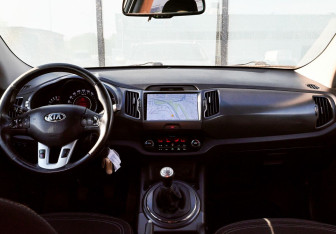 Подержанный автомобиль Kia Sportage 2014 года (18 фото)