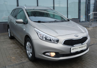 Подержанный автомобиль Kia Ceed Wagon 2014 года (7 фото)