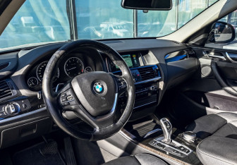 Подержанный автомобиль BMW X4 2015 года (14 фото)