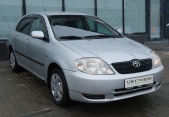 Подержанный автомобиль Toyota Corolla Sedan 2004 года (7 фото)