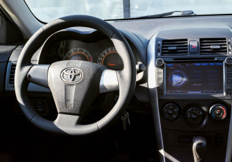 Подержанный автомобиль Toyota Corolla Sedan 2012 года (17 фото)