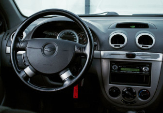 Подержанный автомобиль Chevrolet Lacetti Hatchback 2010 года (18 фото)